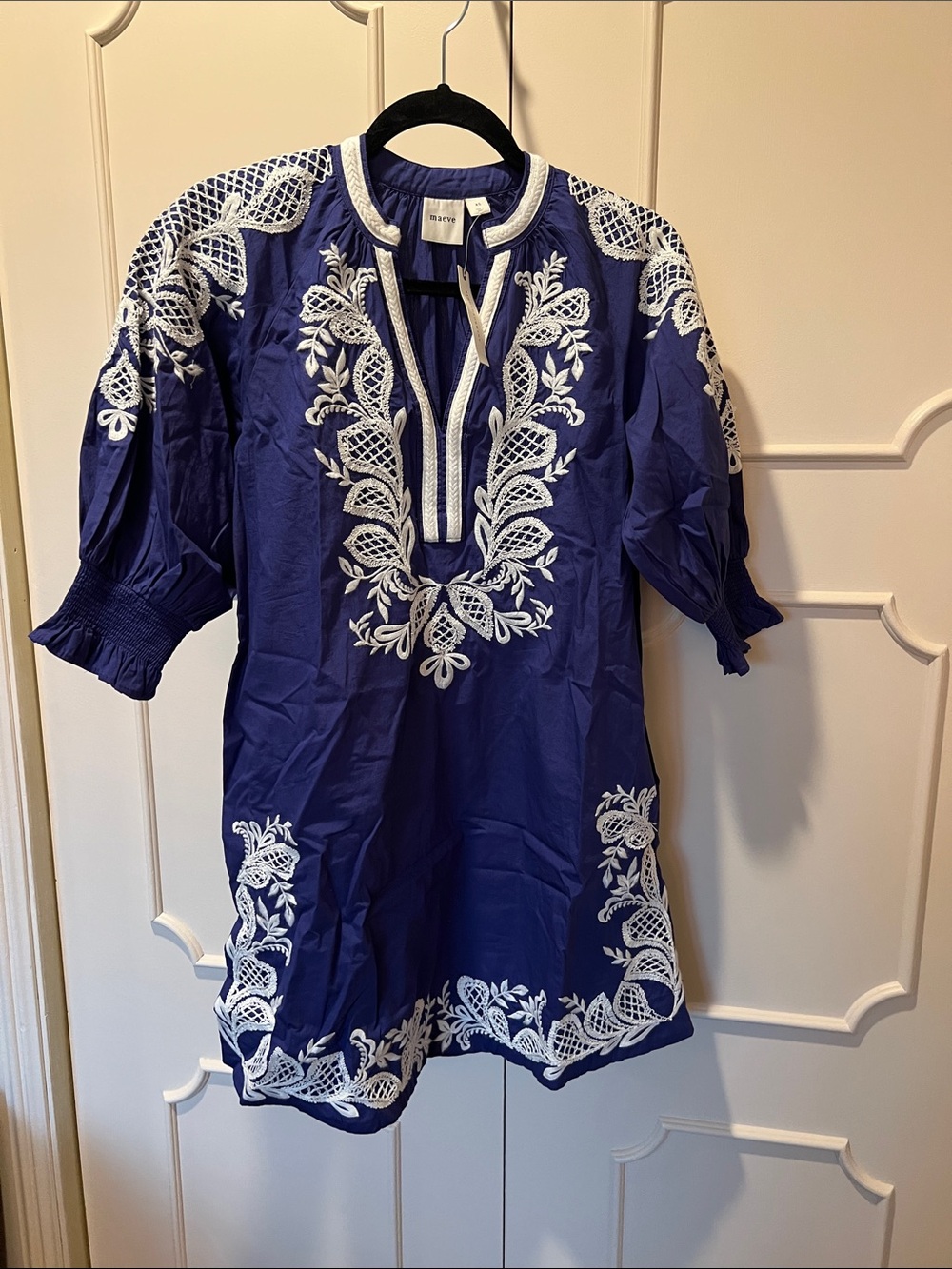 Anthropology’s Maeve Navy Blue Tunic with White Floral Embroidery